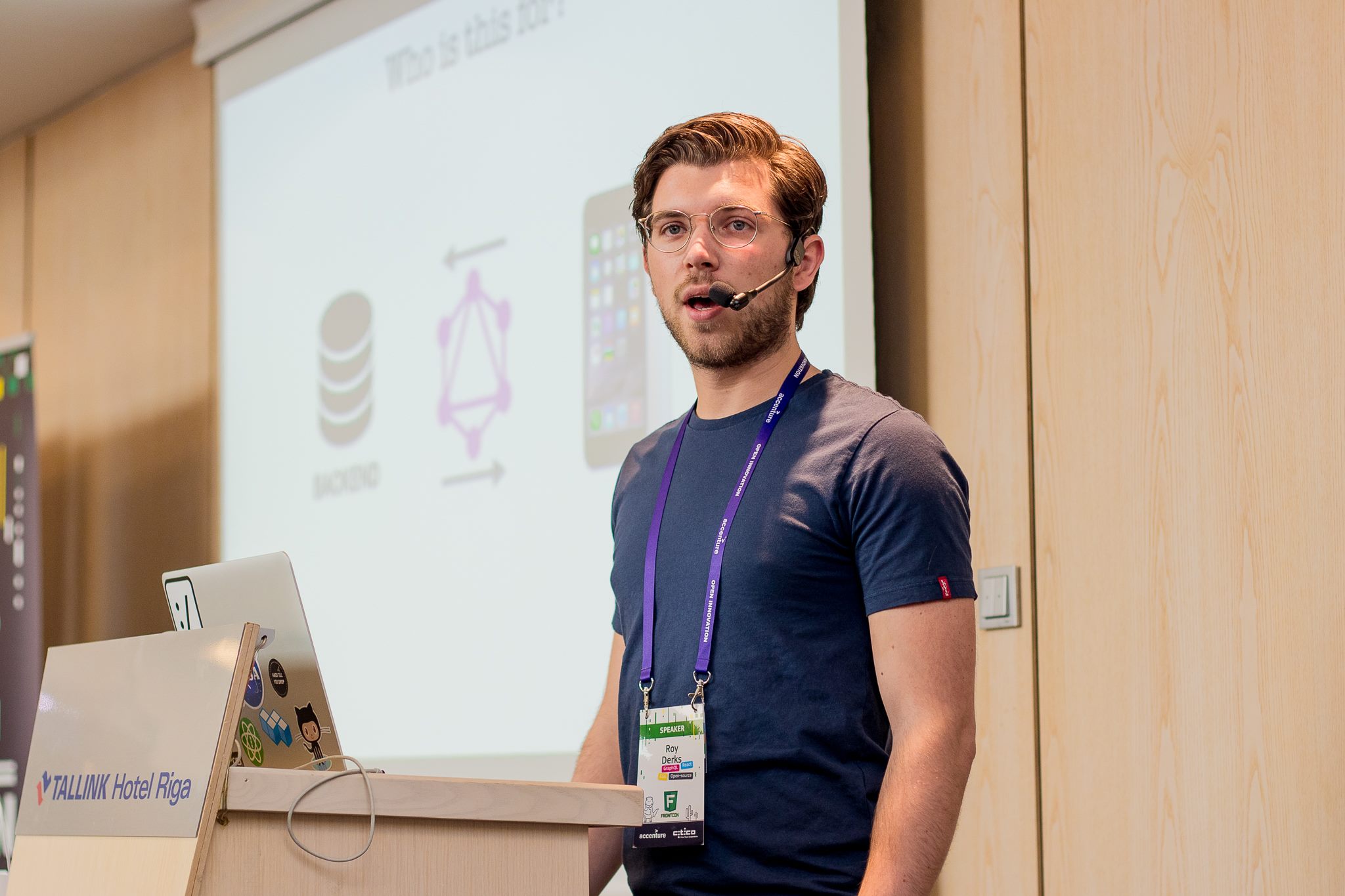 Roy Derks presenting GraphQL Will Do To REST What JSON Did To XML at FrontCon 2019