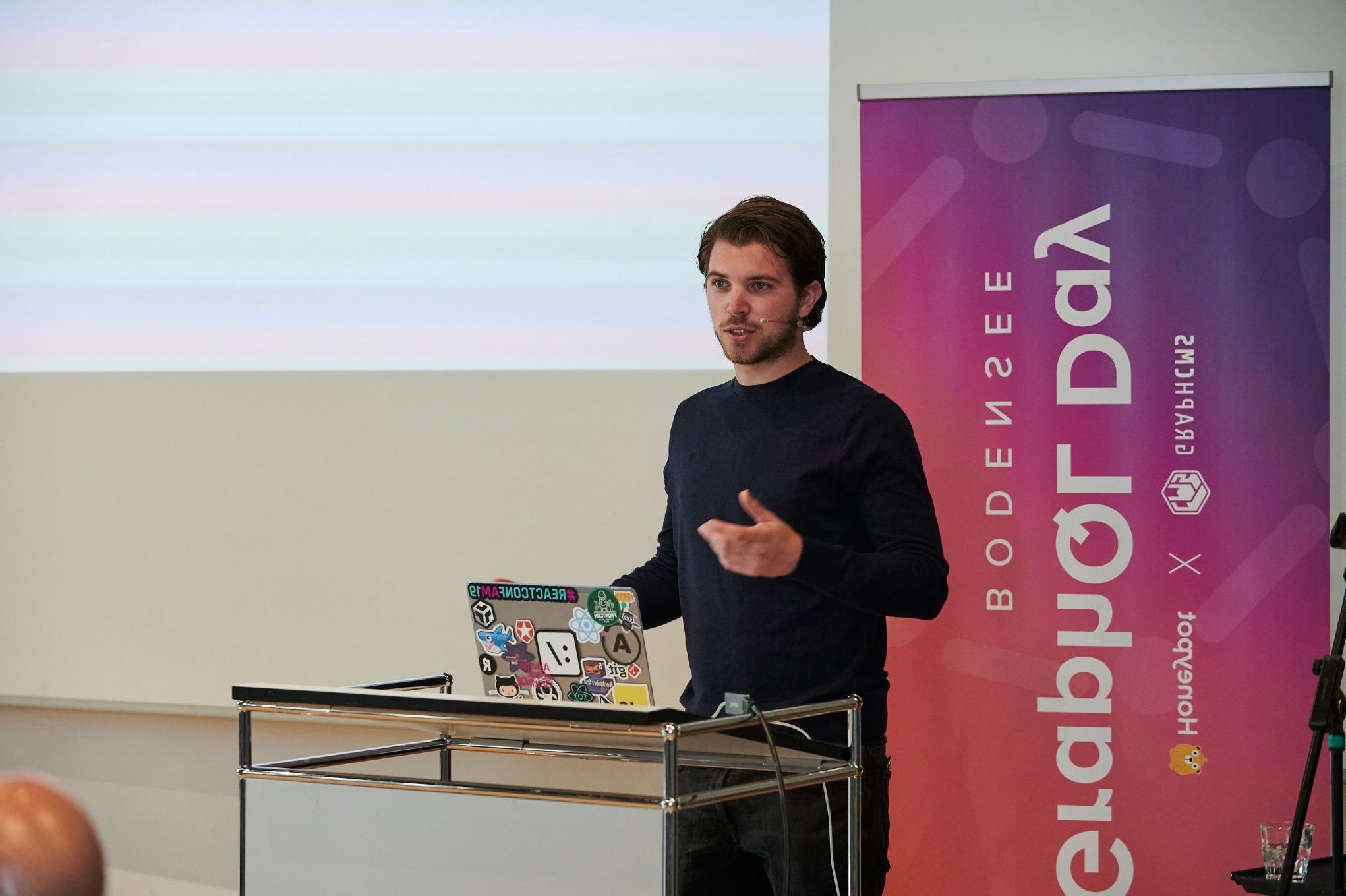 Roy Derks presenting Building GraphQL APIs Without A Server at GraphQL Day Bodensee 2019